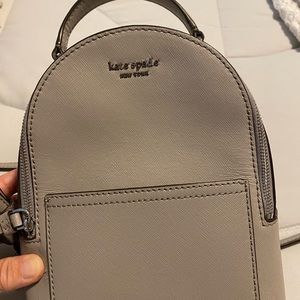 Kate Spade small backpack purse.
